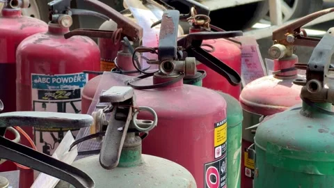 A collection of fire extinguisher cylinders is under repair Video stock 296141555