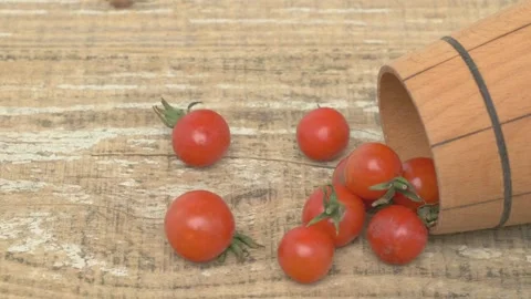 A Collection of Fresh Cherry Tomatoes Arranged Beautifully in a Wooden Basket on Vidéo 287826345