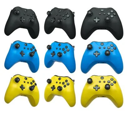 Collection of gaming controllers isolated on white background with clipping.. Illustrazione stock