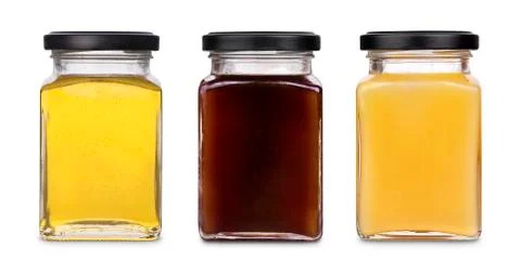 Collection of jars of different types of honey Stock Photos