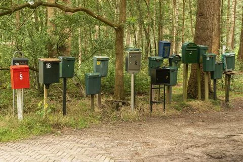 Collection of mailboxes on the road. Stock Photos