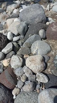 A collection of medium-sized river rocks is usually used as a mixture of bu.. Stock Photos