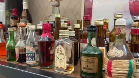 Collection of mini bottles from different countries Stock Footage 141033305