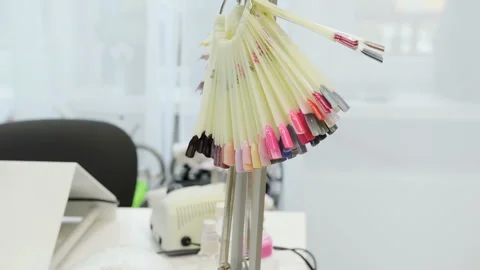 Collection of nail Polish samples. Samples of nail design Stock Footage 115430297