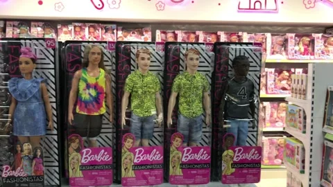 A collection of new Barbie dolls of different multi-ethnic groups Stock Footage