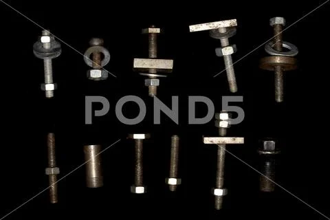 Collection of Old Bolt, Screws, Nuts Engineering Metal Tools on White Background Stock Photos