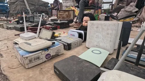 Collection of Old Wireless Routers, Modems and VR Headset Spread at Street Stock Footage 346414138