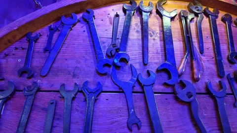 Collection of old wrenches hanging on a wall as decoration 스톡 동영상 329099936