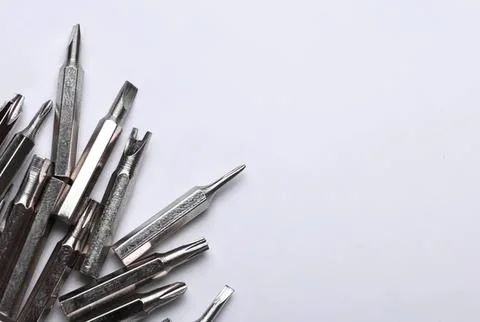Collection of precision screwdrivers and tools on white background Stock Photos