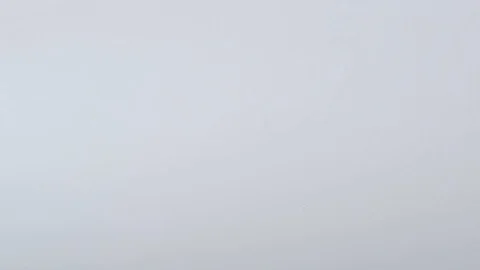 Collection of push pins roll in and out of frame in slow motion Stock Footage 117350139