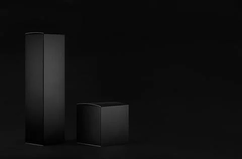 Collection of rectangle tall, square black paper boxes, side view on black ba Stock Photos