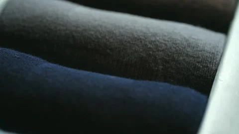 Collection of rolled socks in different colors Stock Footage 314056321