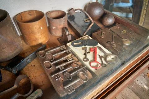 A collection of rustic objects including lots of old keys Stock Photos