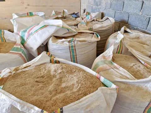 A collection of sacks containing grain Stock Photos