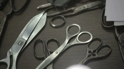 Collection of scissors on the table designer. Close up Stock Footage 43157620