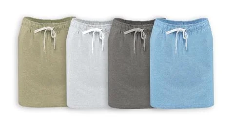 Collection of short knit skirts with a white lace on a white background. Stock Photos