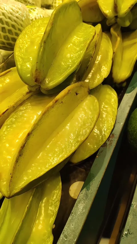 Collection of star fruit in box Stock Footage 276721062