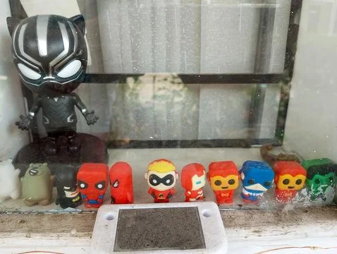 A collection of superhero figurines Stock Photos