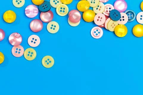 Collection of various colored buttons on colored background - Image Stock Photos