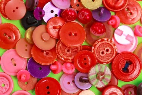 Collection of various colored buttons on colored background - Image Stock Photos