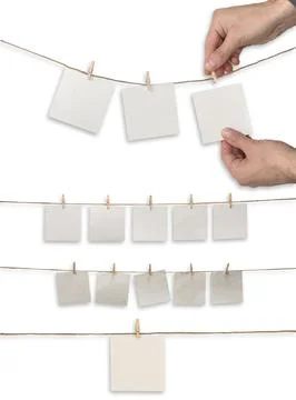 Collection of various notes and a clothes pegs on white background Stock Photos