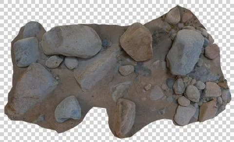 A collection of various sized rocks and pebbles on a sandy surface Stock Photos