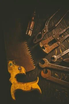 Collection of vintage carpentry tools on old workbench woodworking Stock Photos