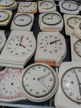 Collection of Vintage Clock Faces at Flea Market Stock Photos