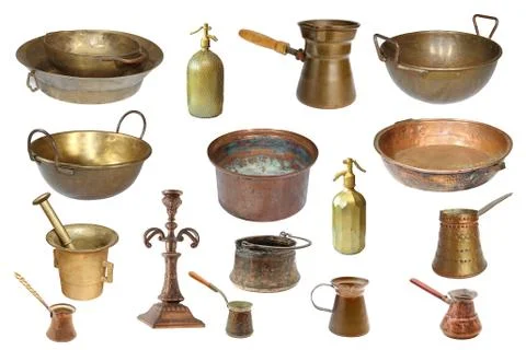 Collection of vintage copper objects isolated over white background Stock Photos