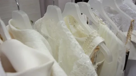 Collection of wedding dresses in the shop Stock Footage 61687843