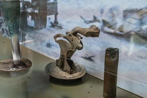 Collection of worn metal objects, possibly tools, on a wooden table Backgro.. Stock Photos