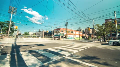 College Bathurst Intersection Toronto Blue Sky Clouds Timelapse 5k Video stock 66790568