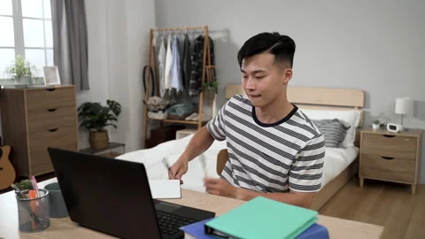 College boy drumming on the desk Vídeo Stock 197367983