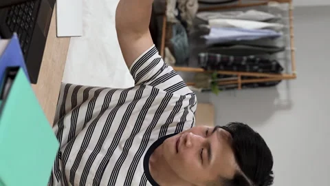 College boy drumming on the desk Stock Footage 227101171