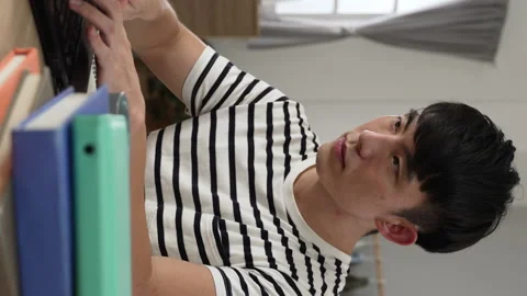 College boy learning from home is typing Video stock 228896268