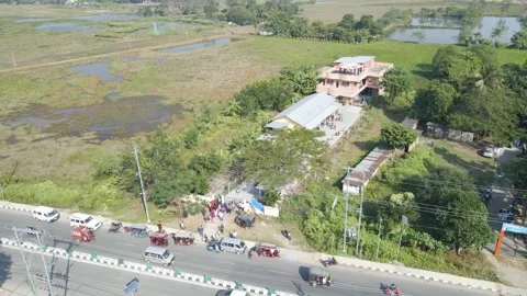 College Campus Gate with Students and Road Traffic in Sualkuchi Assam India Stock Footage 332887568