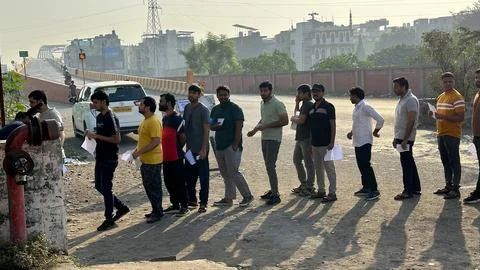 College Candidates standing in queue for exam. Stock Photos