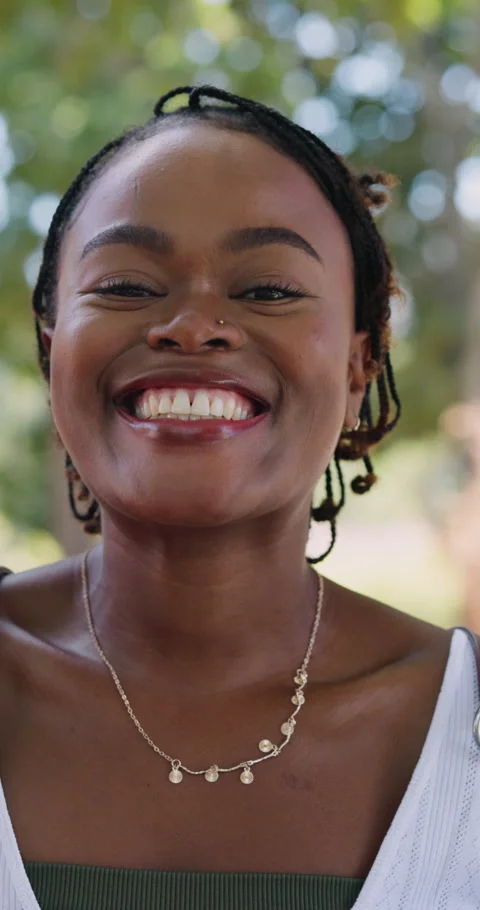 College, face or student on campus with books, knowledge or positive attitude in Stock Footage 341384481
