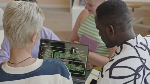 College Friends Coding and Taking on Programming Class Stock Footage 257069534