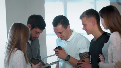 College Friends Talking at the Auditorium While on a Coffee Break Stock-Footage 71778879