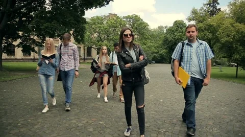 College friends walking to lessons Video stock 65337274