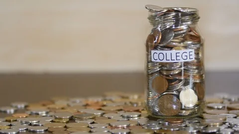 College Funds In A Jar Stockbeeldmateriaal 88624287