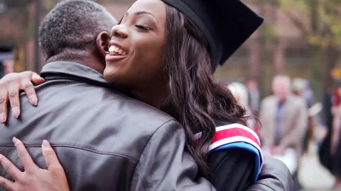 College Graduation, Happy Black College Graduate Female Hugged By Proud Father Stock Footage