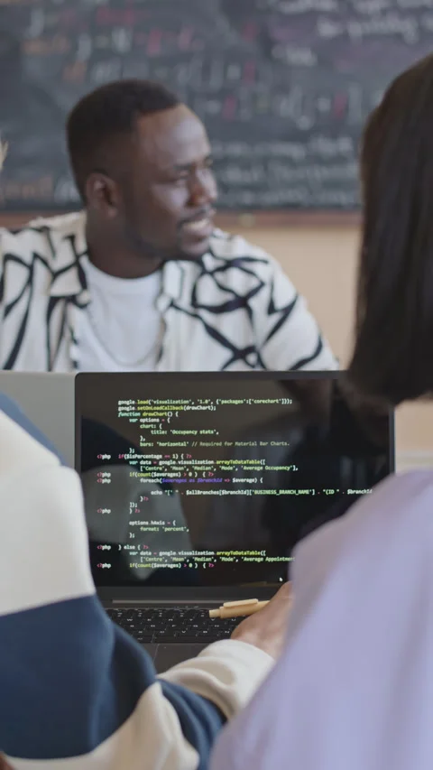 College Group Mates Working in Pair on Programming Code Stock Footage 257746366