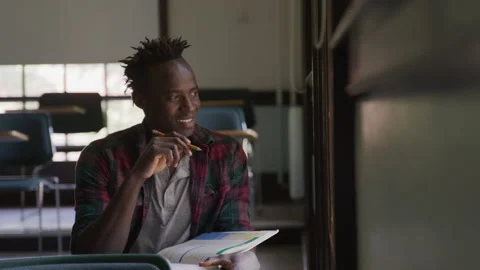 College Student Solving Problems In University Classroom Stock Footage 210220564