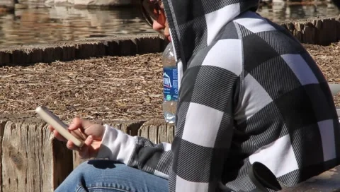 College student texting 2923 Stock Footage 1057187
