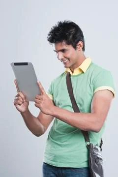 College student using a digital tablet Фото