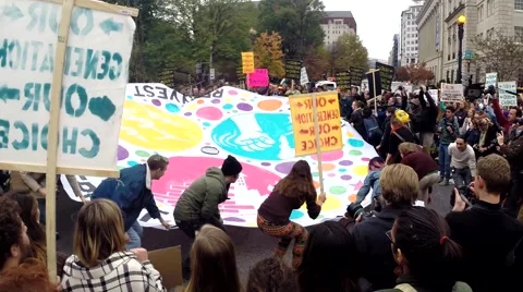 College students and youth rally for environmental protection and human rights Stock Footage 56837726