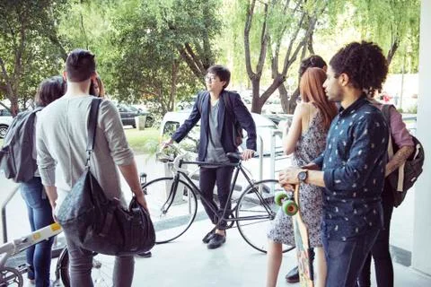 College students chatting after class Stock Photos