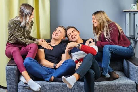 College students communicate in a dormitory. Stock Photos